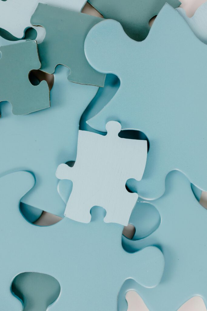 pexels-photo-8385825-8385825 High-quality close-up image of blue puzzle pieces, ideal for creativity and problem-solving themes.